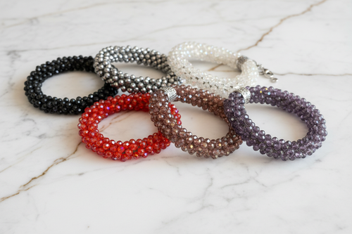 Crystal Beaded Bracelets on Marble