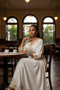 Habesha Woman in Asmara Café with Elegant Bracelet